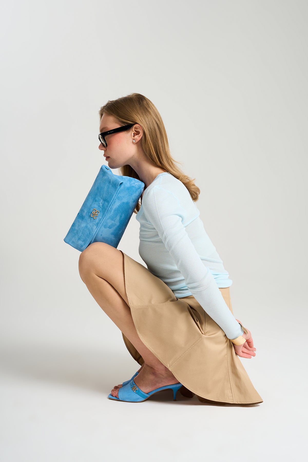 Ira Clutch Baby Blue Suede